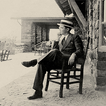 John Dickinson Schneider in chair_350x350