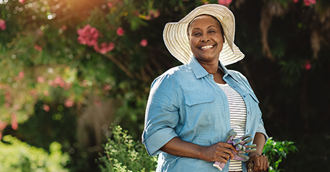 portrait-of-smiling-woman-gardening-maintaining-healthy-skin_480x250