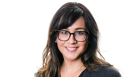 Portrait-of-smiling-woman-wearing-glasses-urology-nurse-corey-knott