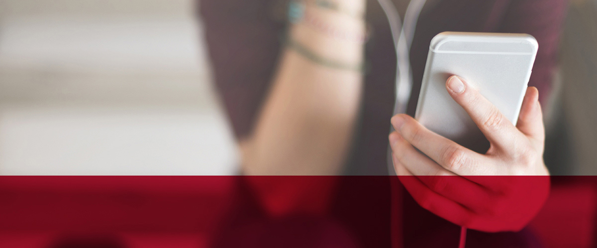 image-person-listening-to-podcast-on-phone-hollister-podcasts_billboard