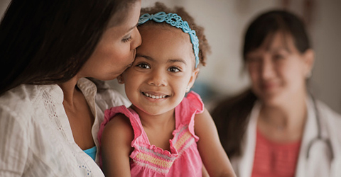 mother-holding-young-daughter-ostomy-pediatric-education_480x250