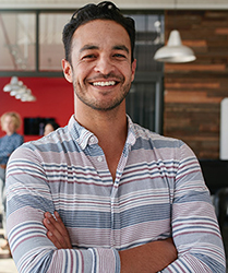 portrait-of-man-in-modern-office-hollister-ostomy-care-learning-center