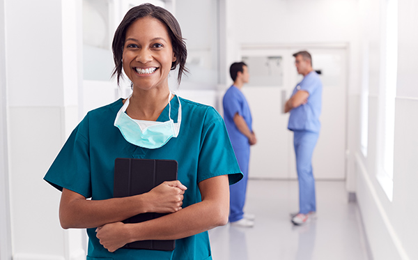 smiling-nurse-holding-tablet-hollister-clinical-education