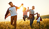 Happy-family-mother-father-children-son-and-daughter-on-sunset-thumbnail