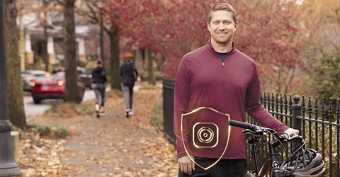 Hollister-CeraPlus-man-next-to-bicycle-in-park_480x250