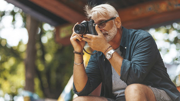 article-2021-Q3-Senior-man-photographing-lifestyle-resize