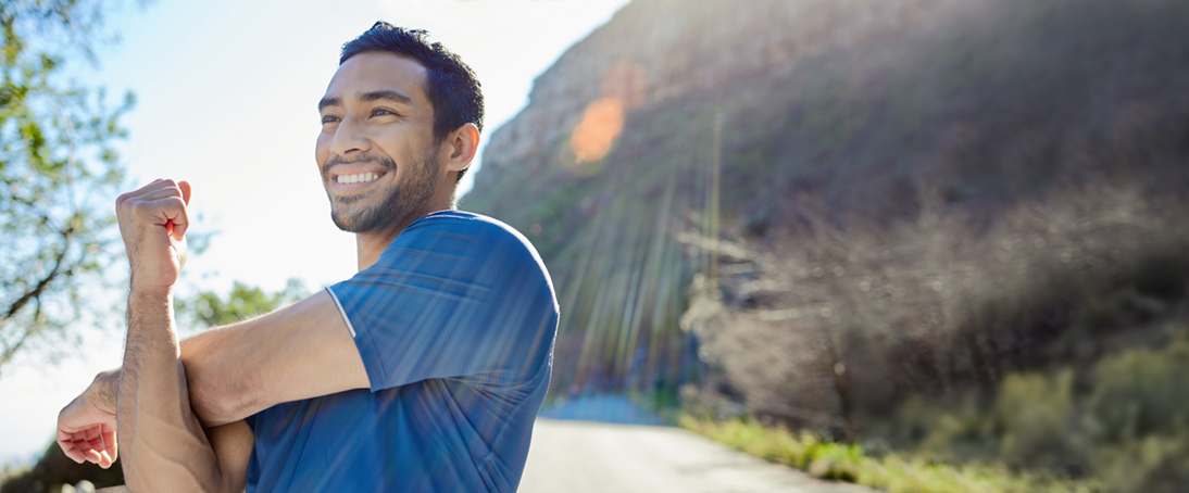 man-stretching-during-workout-welcome-to-hollister-incorporated